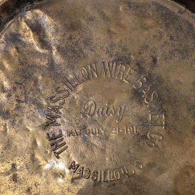 antique "Daisy" wire waste basket made by The Massillon Wire Basket Co. in Massillon, Ohio, which features a patent date of...
