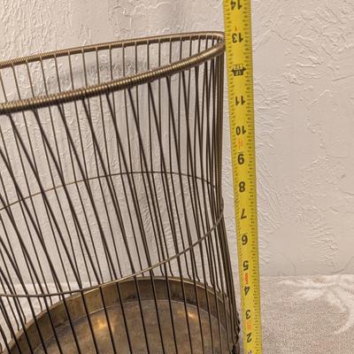 antique "Daisy" wire waste basket made by The Massillon Wire Basket Co. in Massillon, Ohio, which features a patent date of...