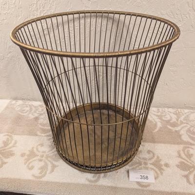 antique "Daisy" wire waste basket made by The Massillon Wire Basket Co. in Massillon, Ohio, which features a patent date of...