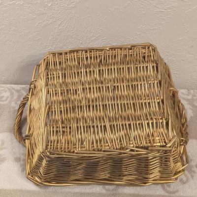 rectangular woven wicker storage basket with handles. 