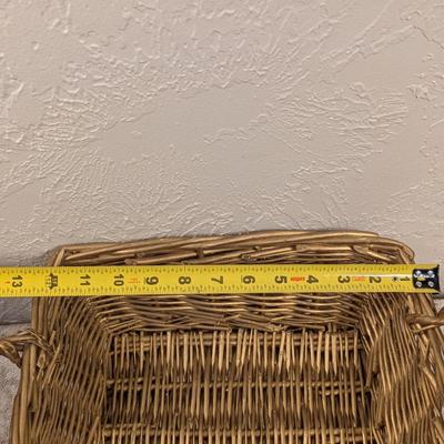 rectangular woven wicker storage basket with handles. 