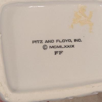 Fitz & Floyd ceramic bunny rabbit climbing out of a white Easter basket figurine