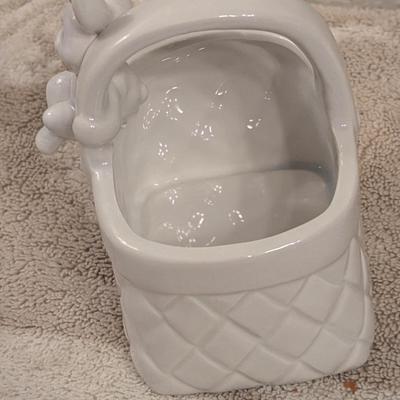 Fitz & Floyd ceramic bunny rabbit climbing out of a white Easter basket figurine