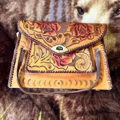 Lot 76 Hand tooled leather purse