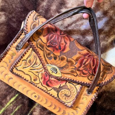 Lot 76 Hand tooled leather purse