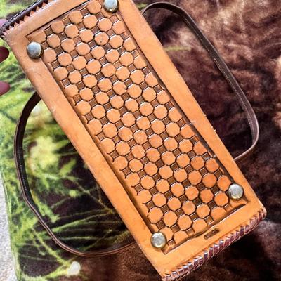 Lot 76 Hand tooled leather purse