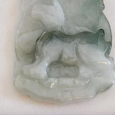 Sale Photo Thumbnail #382: This lot is for a Carved Jade Horse Pendant with Sterling Silver Chain.  This very handsome item comes in a new presentation box. The carving of the horse has been nicely accomplished.  The chain is marked Italy 925.