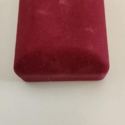 Sale Photo Thumbnail #384: This lot is for a Carved Jade Horse Pendant with Sterling Silver Chain.  This very handsome item comes in a new presentation box. The carving of the horse has been nicely accomplished.  The chain is marked Italy 925.