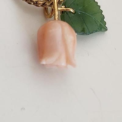 Sale Photo Thumbnail #315: This lot is for a petite Jade & Pink Stone Necklace.  The chain is not marked and appears to be a gold-toned metal.