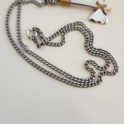 Sale Photo Thumbnail #391: This lot is for an Axe Necklace from Avon.  The axe pendant is nicely executed.  The chain is not marked.