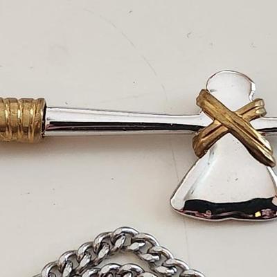 Sale Photo Thumbnail #392: This lot is for an Axe Necklace from Avon.  The axe pendant is nicely executed.  The chain is not marked.