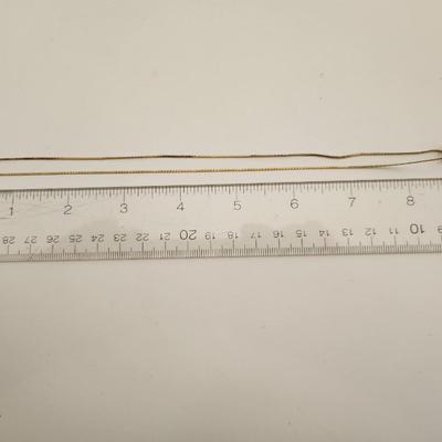 Sale Photo Thumbnail #407: This lot is for a Chain through Heart Costume Necklace.  This handsome piece is not marked, it appears to be a gold-toned metal with glass gems. Would be a great beginning jewelry gift for a young person.