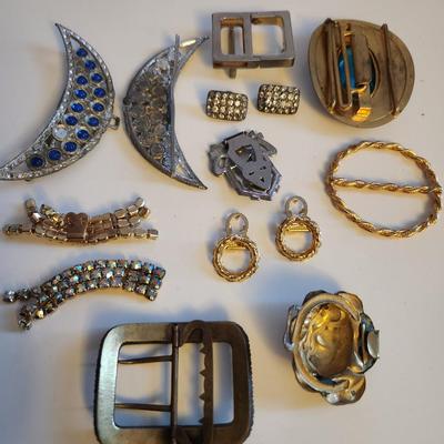 Sale Photo Thumbnail #418: This lot is for a gathering of Vintage Buckles & Bows. This belt buckles and shoe clips are what they are.  Use them as is or make them into whatever you might fancy.  A few gems are missing but it is a nice little collection.