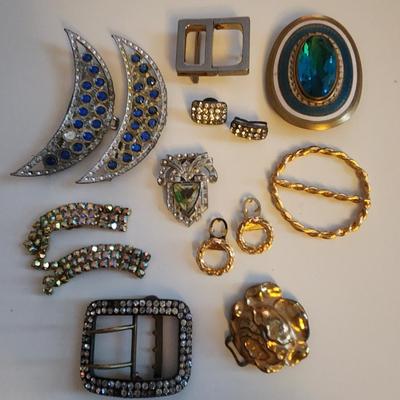 Sale Photo Thumbnail #419: This lot is for a gathering of Vintage Buckles & Bows. This belt buckles and shoe clips are what they are.  Use them as is or make them into whatever you might fancy.  A few gems are missing but it is a nice little collection.