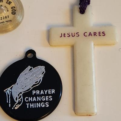 Sale Photo Thumbnail #425: This lot is for a gathering of Vintage Religious Items.  Includes crosses, praying hand and a mustard seed, plus a sweet Mary pin and a Madonna and Child necklace.