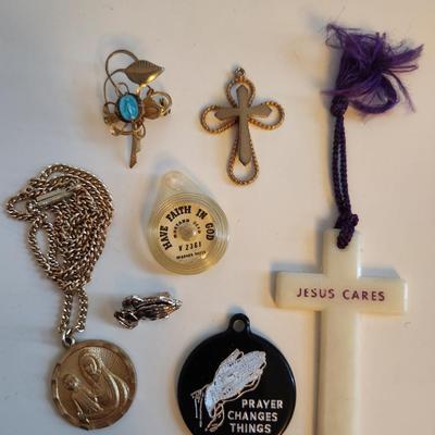 Sale Photo Thumbnail #421: This lot is for a gathering of Vintage Religious Items.  Includes crosses, praying hand and a mustard seed, plus a sweet Mary pin and a Madonna and Child necklace.