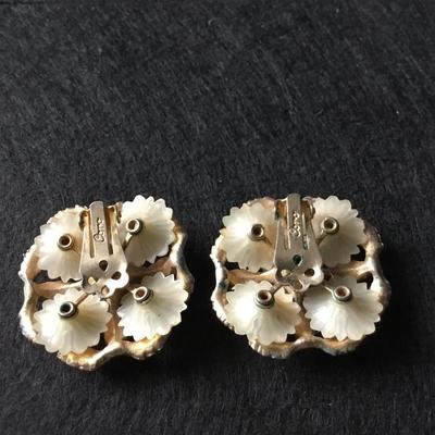 Vintage gold tone Coro flower cluster clip on earrings with white petals and rhinestone centers