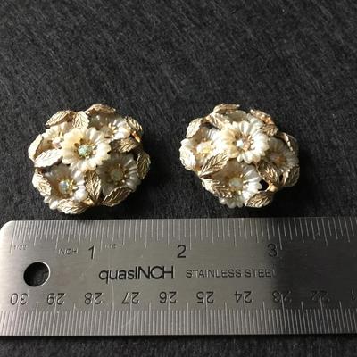 Vintage gold tone Coro flower cluster clip on earrings with white petals and rhinestone centers