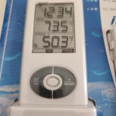 Sale Photo Thumbnail #433: This lot is for a Wireless Temperature Station.  This is a La Crosse Technology Model 9121.  It is new and has not been taken from its original packaging.  Fun item for your favorite weather freak.