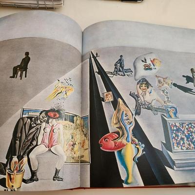 Sale Photo Thumbnail #440: This lot is for a copy of Dali, a beautiful coffee table book.  This large and heavy book has page after page of pictures and information of one of the worlds most recognized artist.  In good condition for its age.