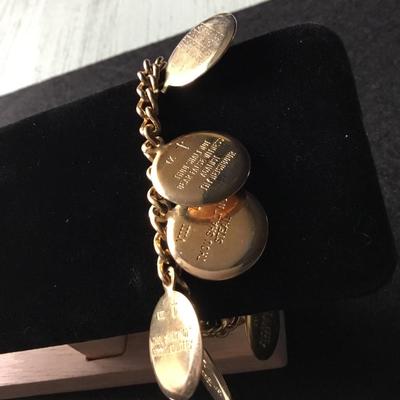 Vintage gold tone Ten Commandments charm bracelet