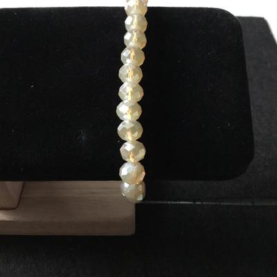 Champagne colored faceted beaded stretch bracelet