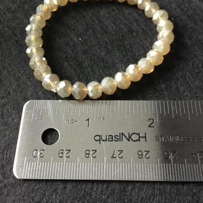 Champagne colored faceted beaded stretch bracelet