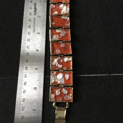 Vintage gold tone link red/ orange confetti lucite bracelet