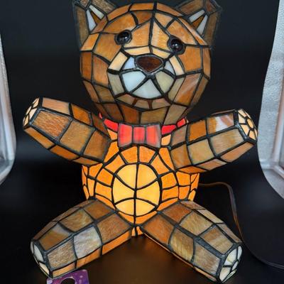 Sale Photo Thumbnail #356: Beautiful stained glass bear, hollow with single light inside.  
No nicks or cracks, very good condition 
13.5 inches tall x 11.5 inches wide,  10 inches deep