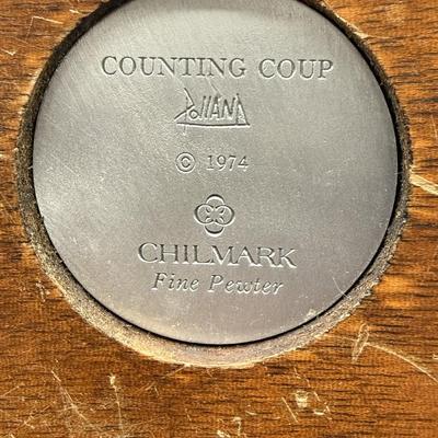 Sale Photo Thumbnail #358: Pewter Sculpture dated 1974 depicts Native American with shield.
On wooden base.  Collectible by Chilmark 
Fine pewter by Donald Polland
It is missing the coup stick
6 inches by 3.5 inches tall