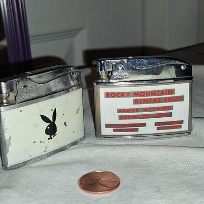 Sale Photo Thumbnail #134: Playboy lighter has some paint loss. 
Balboa lighter advertised for "Rocky" (lol) Mountain Tools
I believe both with work with new flints & a good cleaning & filling.