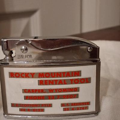 Sale Photo Thumbnail #131: Playboy lighter has some paint loss. 
Balboa lighter advertised for "Rocky" (lol) Mountain Tools
I believe both with work with new flints & a good cleaning & filling.