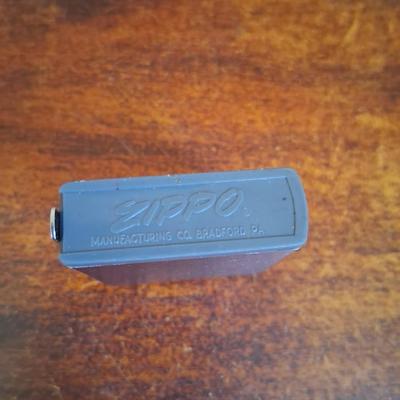 Sale Photo Thumbnail #140: 1960s Zippo Tape measurer. Excellent condition. Tape itself is in excellent condition with the early script Zippo name on the tape. Only slight wear on the case. This item is no longer made. Production stopped in 2007.