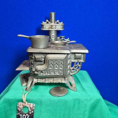 Sale Photo Thumbnail #364: Cast Iron, it could be a Salesman Sample or child's toy,  It has 2 cookware pieces.  
good condition