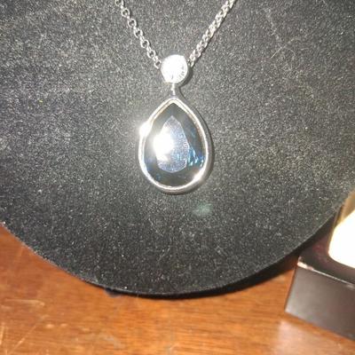 Sale Photo Thumbnail #150: This necklace was designed by the "Nice" company in Mexico. Fine Jewelry was created there such as this necklace. 18 karat heavy rolled white gold with a Rhodium finish. This is an amazing necklace. Costume ring with Topaz color stone marked JS