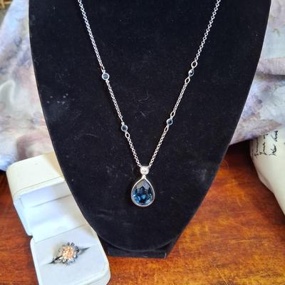 Sale Photo Thumbnail #156: This necklace was designed by the "Nice" company in Mexico. Fine Jewelry was created there such as this necklace. 18 karat heavy rolled white gold with a Rhodium finish. This is an amazing necklace. Costume ring with Topaz color stone marked JS