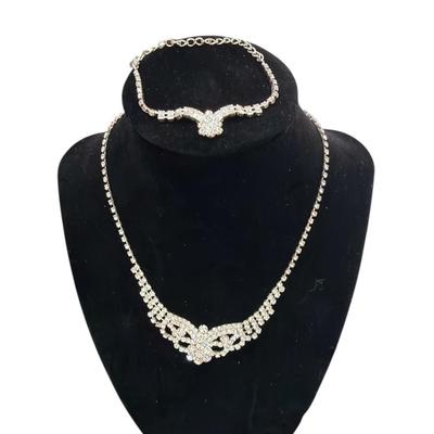 Sale Photo Thumbnail #301: Rhinestone Necklace and Bracelet Set  Provides a dazzling, elegant look.