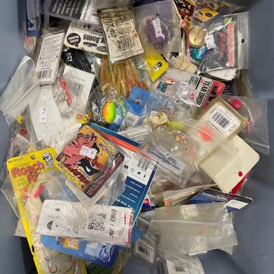 Tote of misc fishing tackle