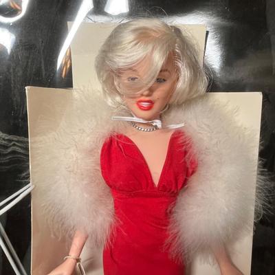 Lot 108 Marilyn Monroe Doll & magazine