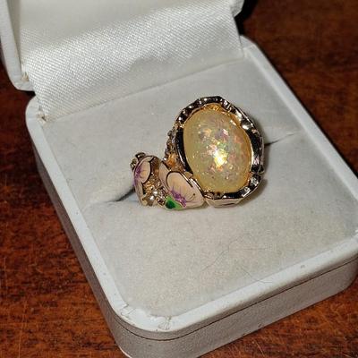 Sale Photo Thumbnail #171: Crystal accents. This ring is statement upon statement.  The Flowers wrap around the ring, flow down the shoulders & are pepper with Crystal accents. Size 7 1/2