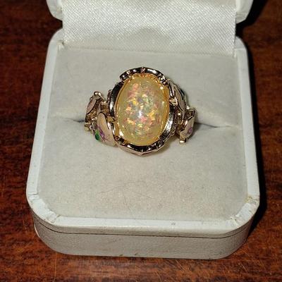 Sale Photo Thumbnail #177: Crystal accents. This ring is statement upon statement.  The Flowers wrap around the ring, flow down the shoulders & are pepper with Crystal accents. Size 7 1/2