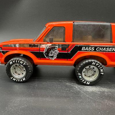 Vintage Nylint Die-Cast Toys – Bass Chaser SUV & Yellow Dump Truck (1970s–80s)
