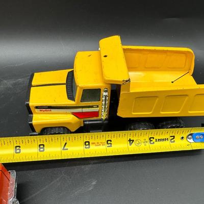 Vintage Nylint Die-Cast Toys – Bass Chaser SUV & Yellow Dump Truck (1970s–80s)