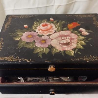 Sale Photo Thumbnail #240: Flatware just for display

Hand painted Large Flatware Box, Ebony Painted with Dutch Floral Design. 
Velvet lined, with Accessories Drawer. 
Wood construction