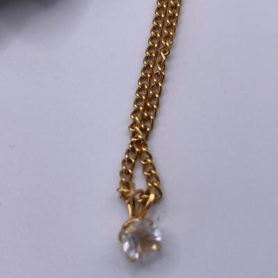 Gold tone leaf bracelet and clip ons with gold tone necklace