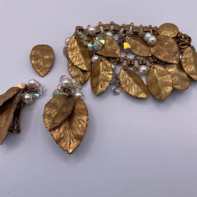 Gold tone leaf bracelet and clip ons with gold tone necklace