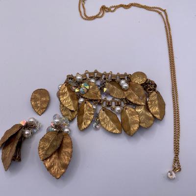 Gold tone leaf bracelet and clip ons with gold tone necklace