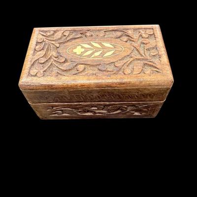 Sale Photo Thumbnail #385: Small Vintage Hand Carved Wooden Box From India with Inlaid Floral Marquety Design
Approximately 4.5" wide