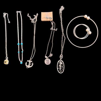 Sale Photo Thumbnail #386: Six Silver Toned Necklaces