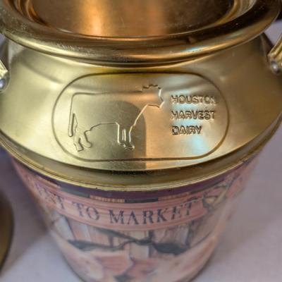 Sale Photo Thumbnail #129: Vintage Houston Harvest decorative tin milk cans 
14" tall x 11" wide